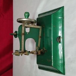 Antique toy sewing machine working condition
